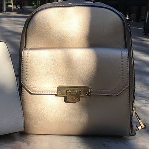 Aldo Gold metallic backpack purse